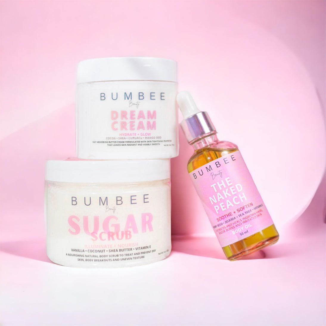 Photo of three skincare products: sugar scrub, ingrown hair oil, and body cream. Made with organic and natural ingredients for luxurious skincare